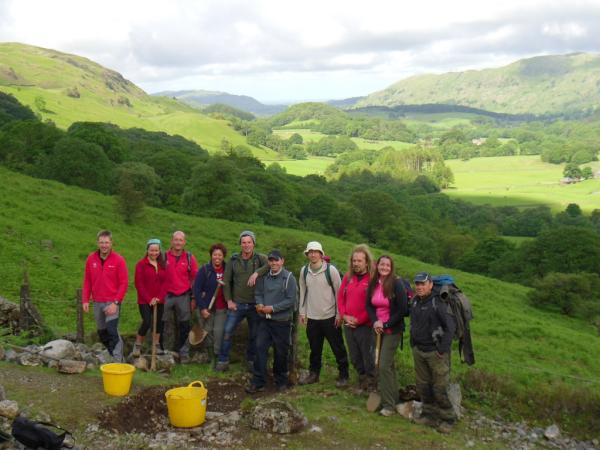 People fixing the fells